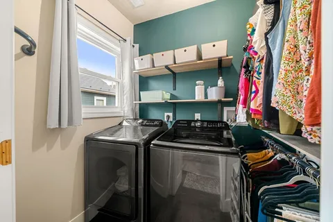 a kitchen with stainless steel appliances granite countertop a stove and a sink