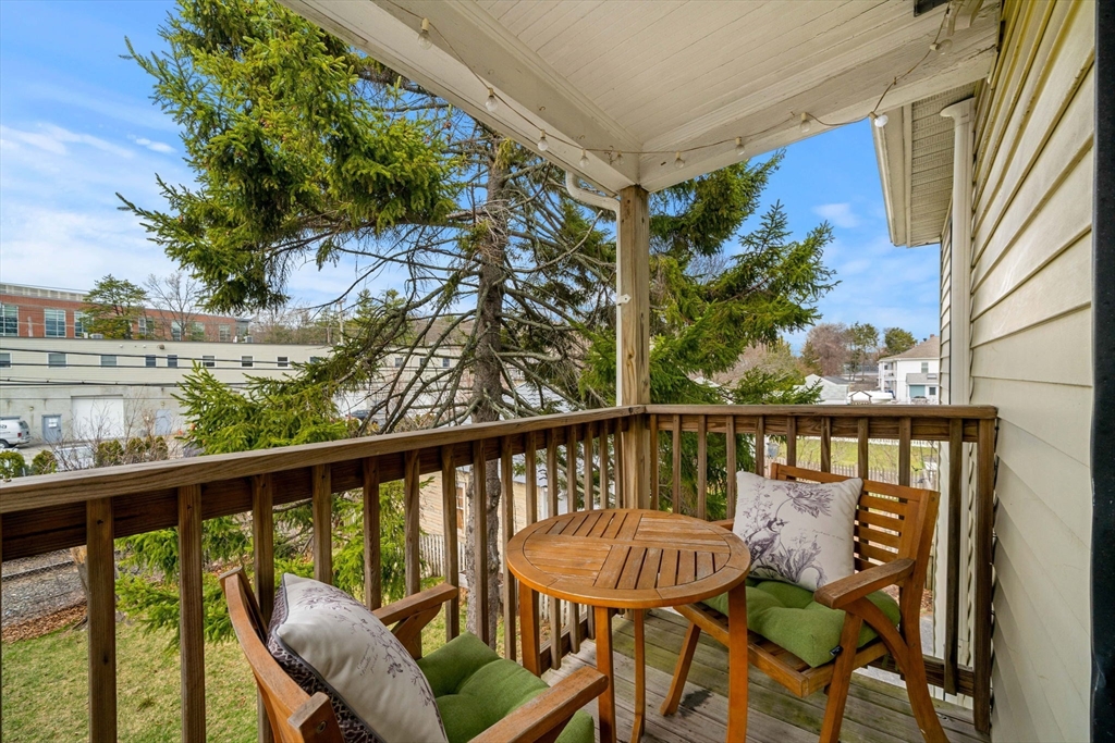104 Stetson Avenue, Unit 2 Swampscott, MA 01907 - Photo 26 of 33 a view of a chair and table in the balcony