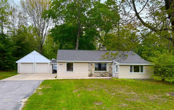 $395,000 | 8921 Highway 31, Grawn, MI 49637