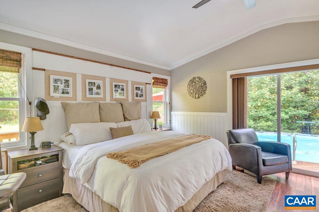 2523 Ridge Road Palmyra, VA 22963 - Photo 21 of 44 a bedroom with a bed and a large window