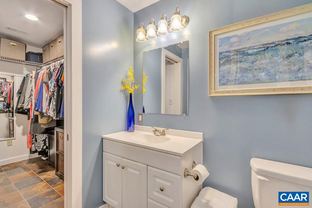 2523 Ridge Road Palmyra, VA 22963 - Photo 23 of 44 a bathroom with a sink vanity and a mirror
