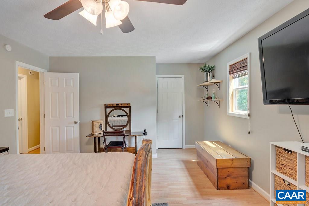 2523 Ridge Road Palmyra, VA 22963 - Photo 25 of 44 a living room with furniture and a flat screen tv