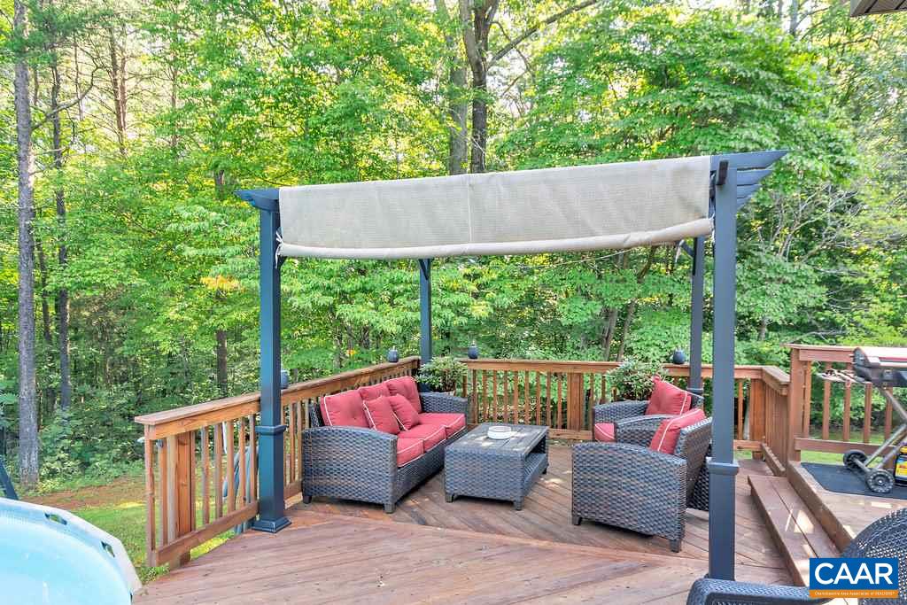 2523 Ridge Road Palmyra, VA 22963 - Photo 30 of 44 a view of deck with furniture and a backyard