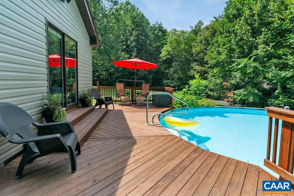 2523 Ridge Road Palmyra, VA 22963 - Photo 33 of 44 a view of a swimming pool with a patio
