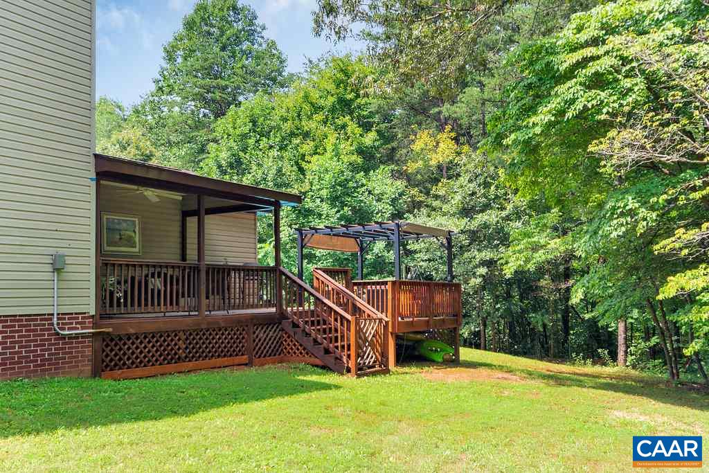 2523 Ridge Road Palmyra, VA 22963 - Photo 36 of 44 a view of a house with a yard and deck