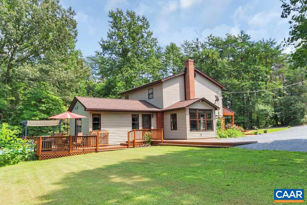 2523 Ridge Road Palmyra, VA 22963 - Photo 37 of 44 a front view of a house with garden