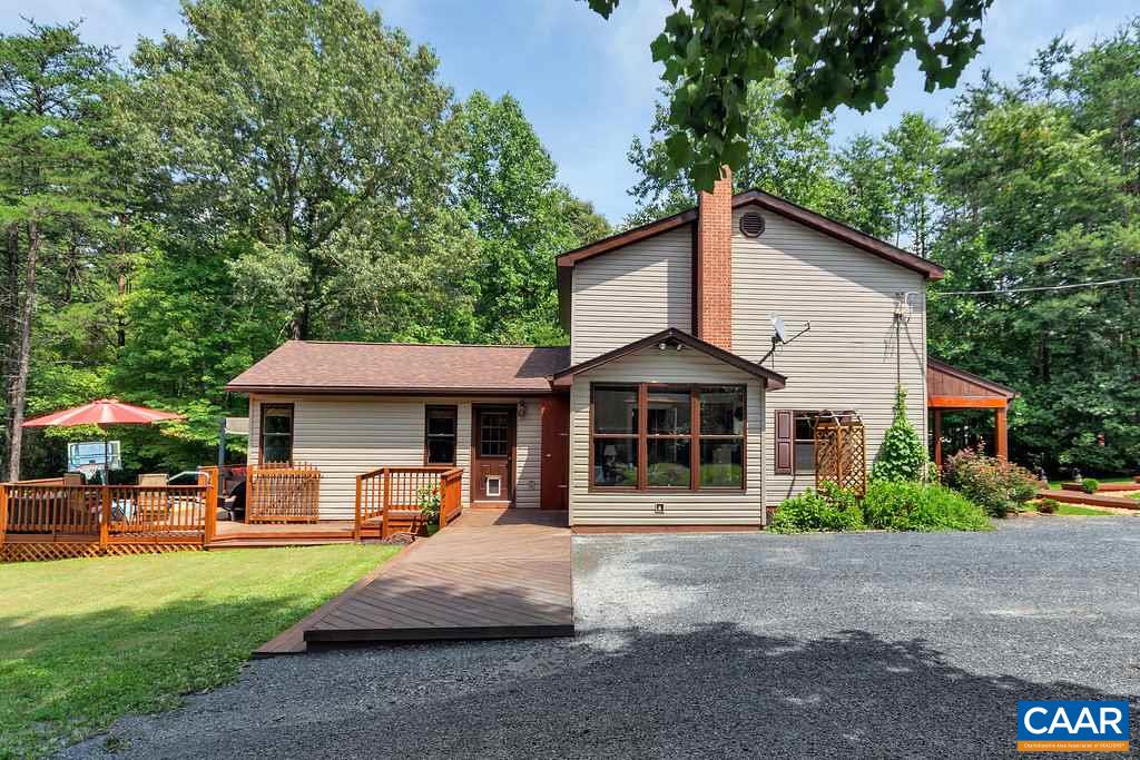 2523 Ridge Road Palmyra, VA 22963 - Photo 40 of 44 a front view of a house with garden