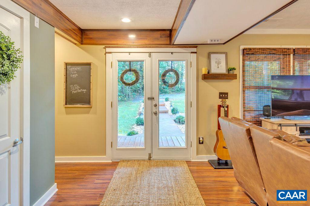 2523 Ridge Road Palmyra, VA 22963 - Photo 4 of 44 a view of a hallway with workspace and windows