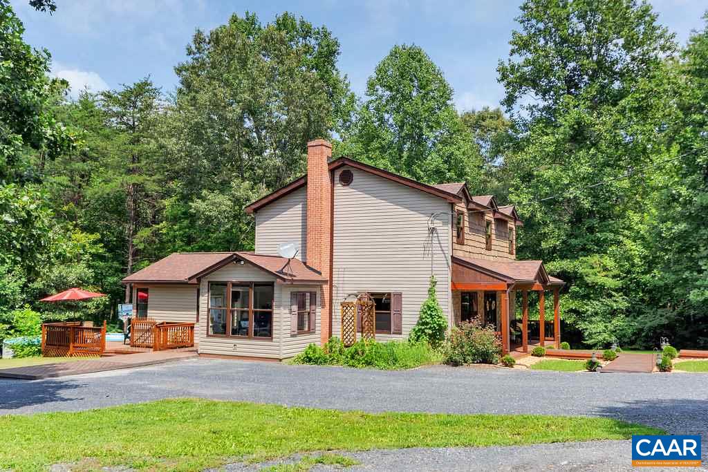 2523 Ridge Road Palmyra, VA 22963 - Photo 41 of 44 a front view of a house with a yard