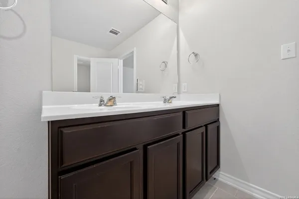 a sink with a mirror