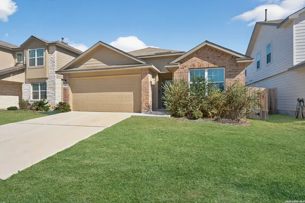 front view of a house and a yard