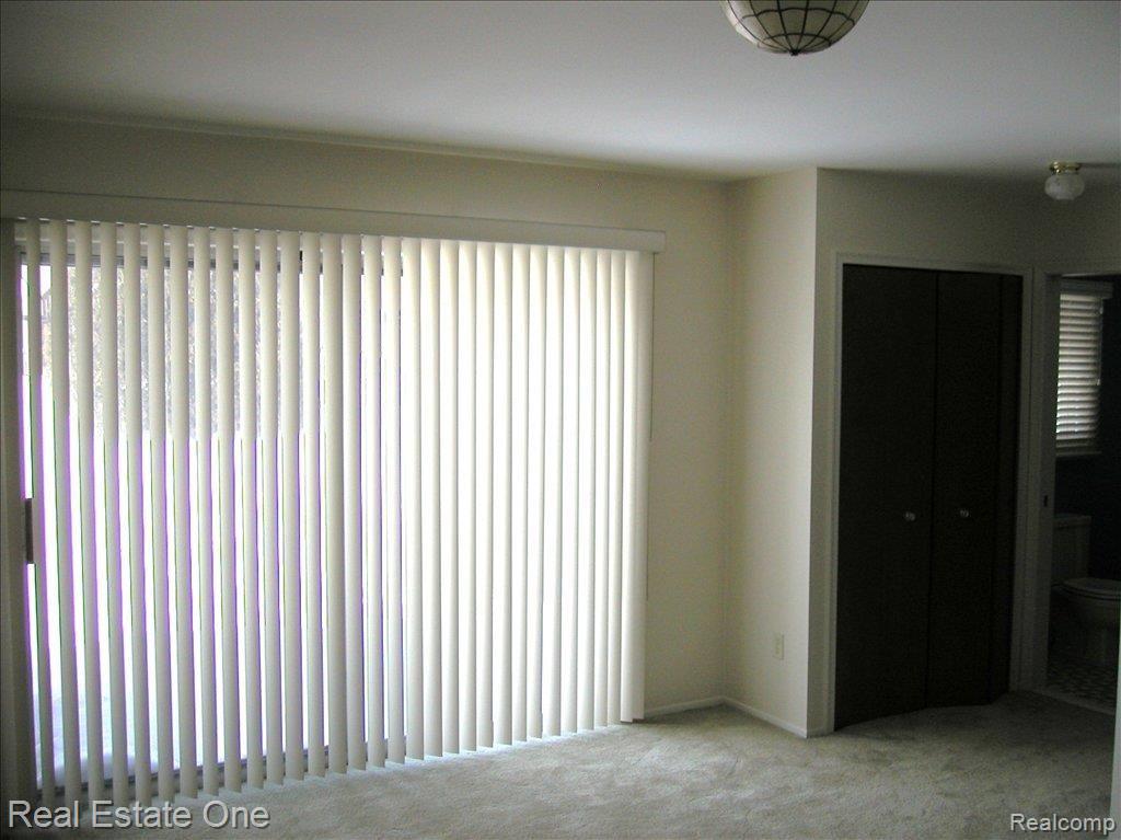 12001 North Canton Center Road Plymouth, MI 48170 - Photo 9 of 19 Master Br suite w/doorwall