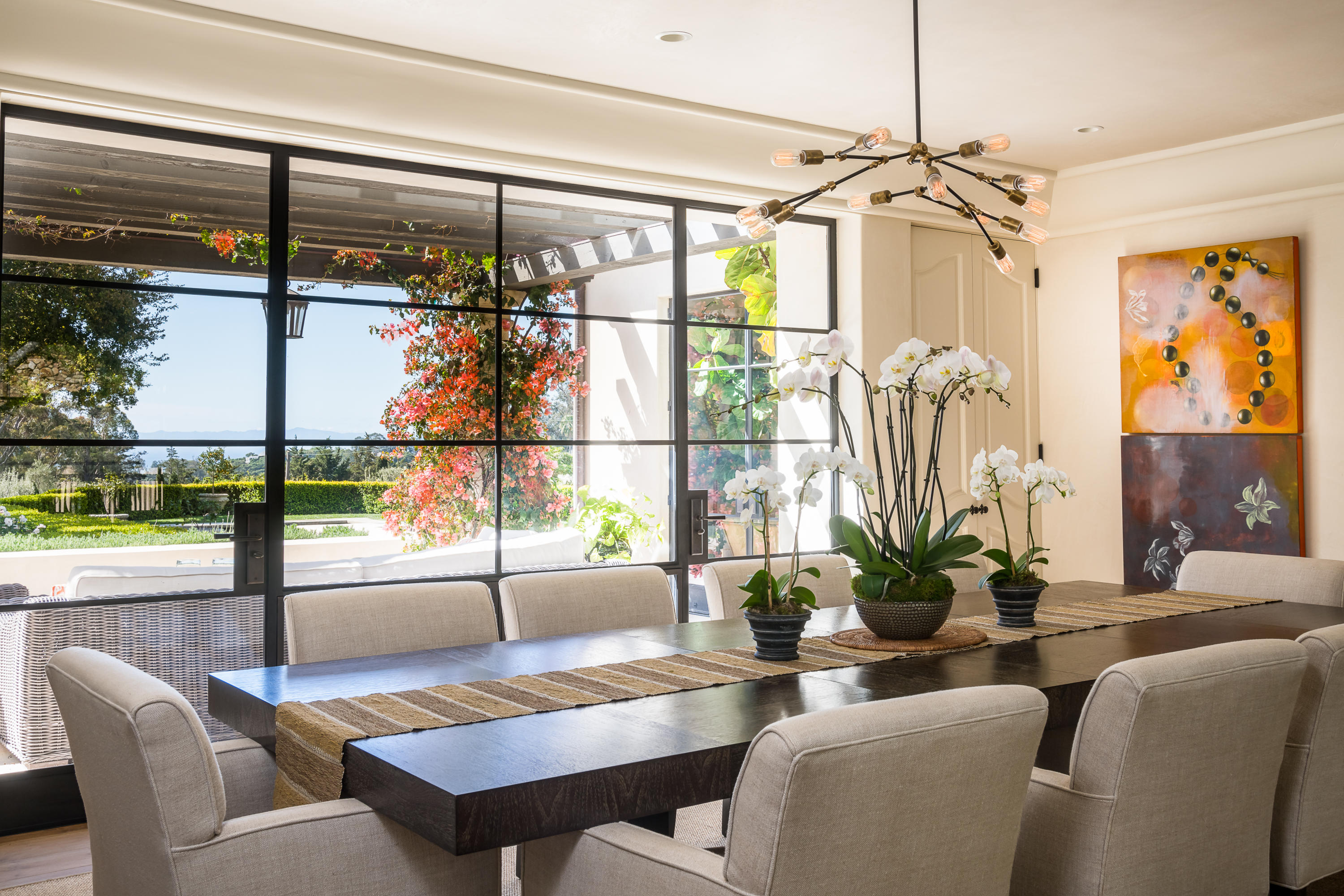 760 Riven Rock Road Montecito, CA 93108 - Photo 11 of 50 a dining room with furniture a chandelier and window