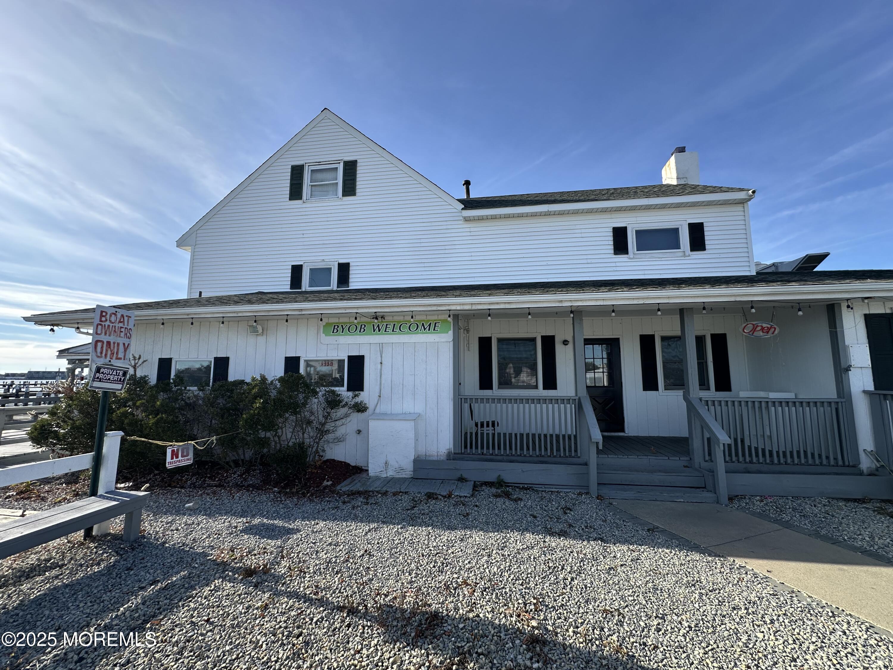 Bayside Terrace Seaside Heights, NJ 08751 - Photo 7 of 13 a front view of a house with garden