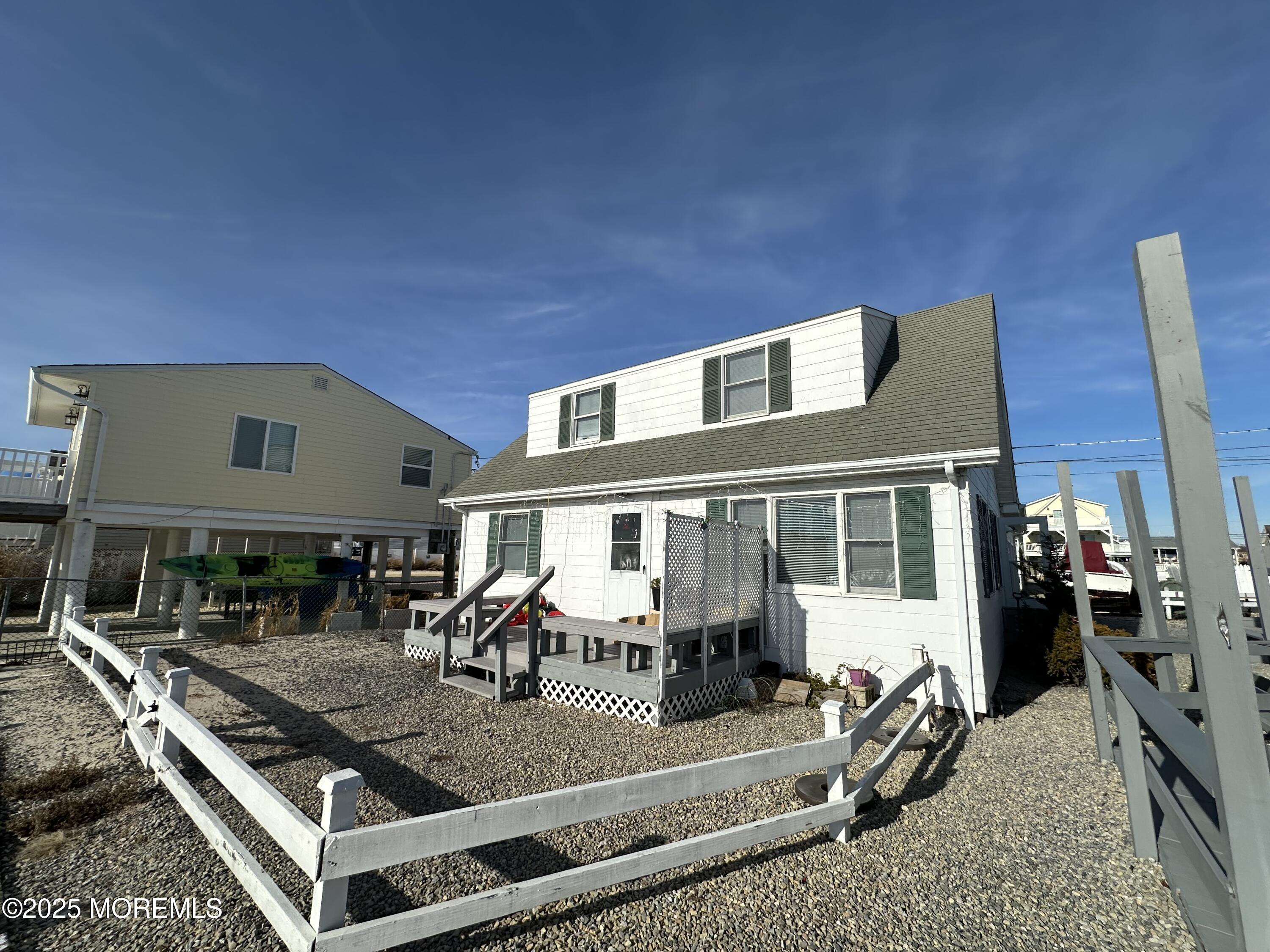 Bayside Terrace Seaside Heights, NJ 08751 - Photo 9 of 13 a view of a house with backyard