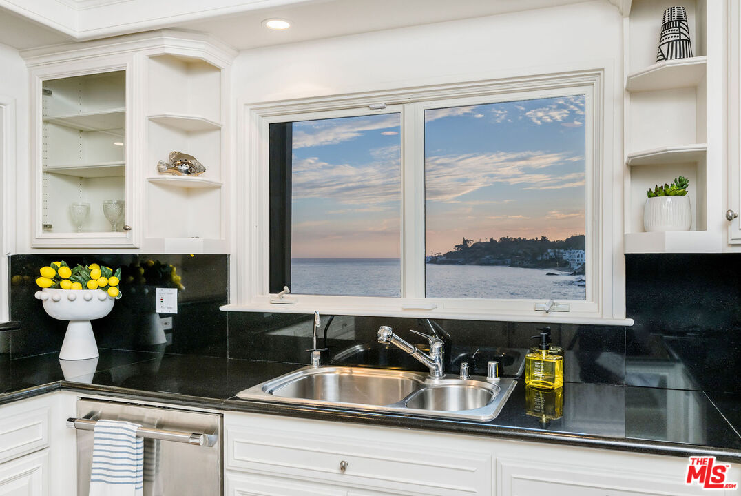 26174 Pacific Coast Highway Malibu, CA 90265 - Photo 11 of 33 a kitchen with a sink and a window