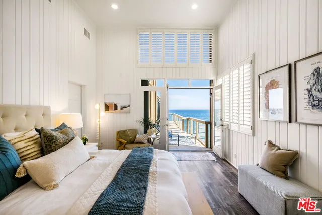 a bedroom with furniture and a couch