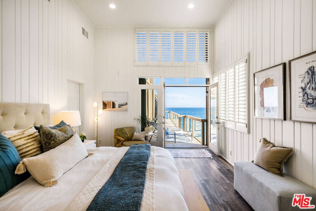 26174 Pacific Coast Highway Malibu, CA 90265 - Photo 13 of 33 a bedroom with furniture and a couch
