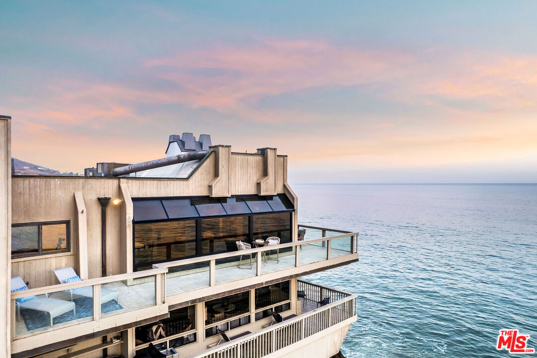 26174 Pacific Coast Highway Malibu, CA 90265 - Photo 31 of 33 a view of a balcony with an ocean view