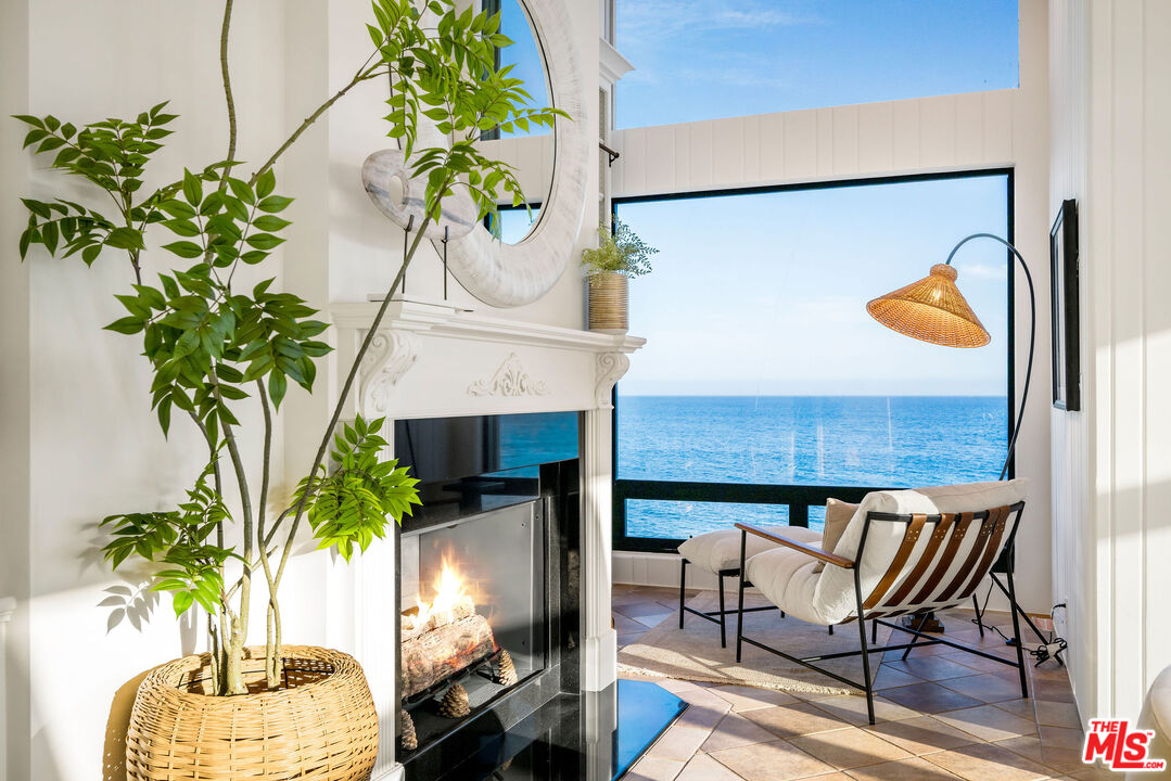 26174 Pacific Coast Highway Malibu, CA 90265 - Photo 5 of 33 view of living room with furniture and a potted plant