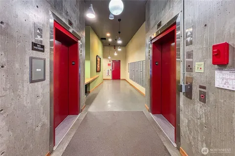 a view of a hallway with windows