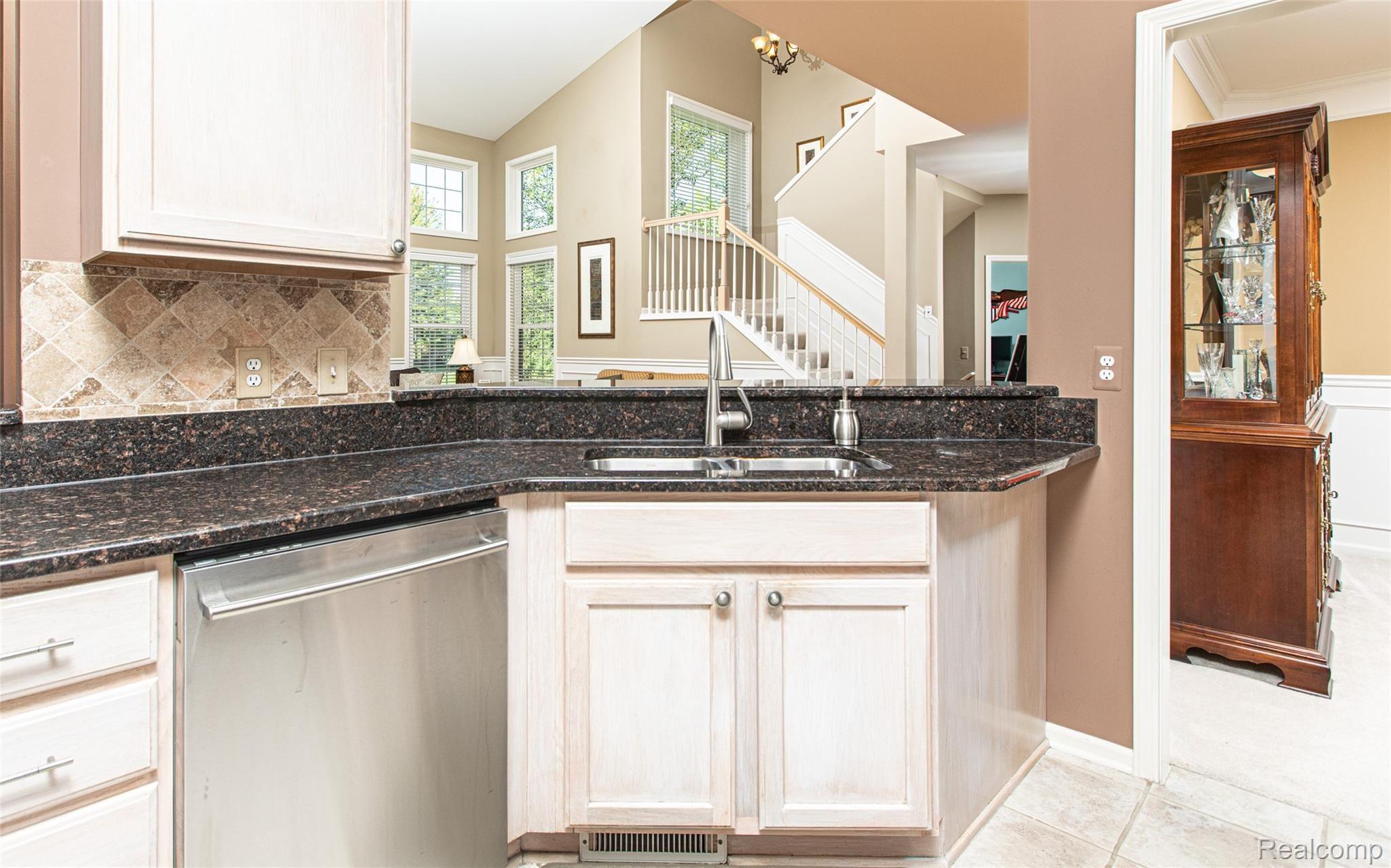 4124 Wincrest Lane Rochester, MI 48306 - Photo 12 of 39 Granite Kitchen Open into Family Room