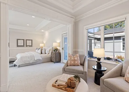 a bath tub sitting next to a white sink