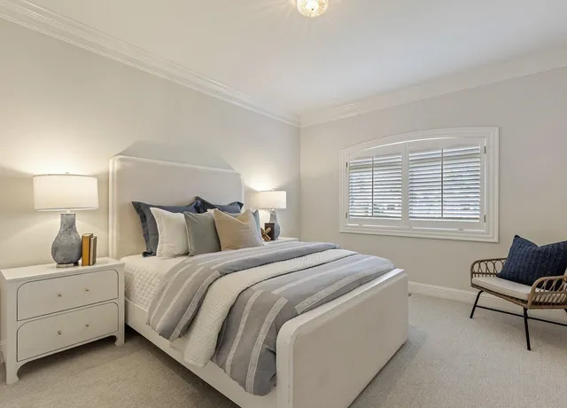 a view of a patio with couches chairs and a fire pit