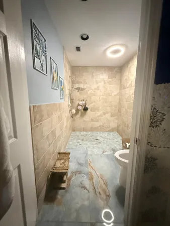 a bathroom with a sink and mirror