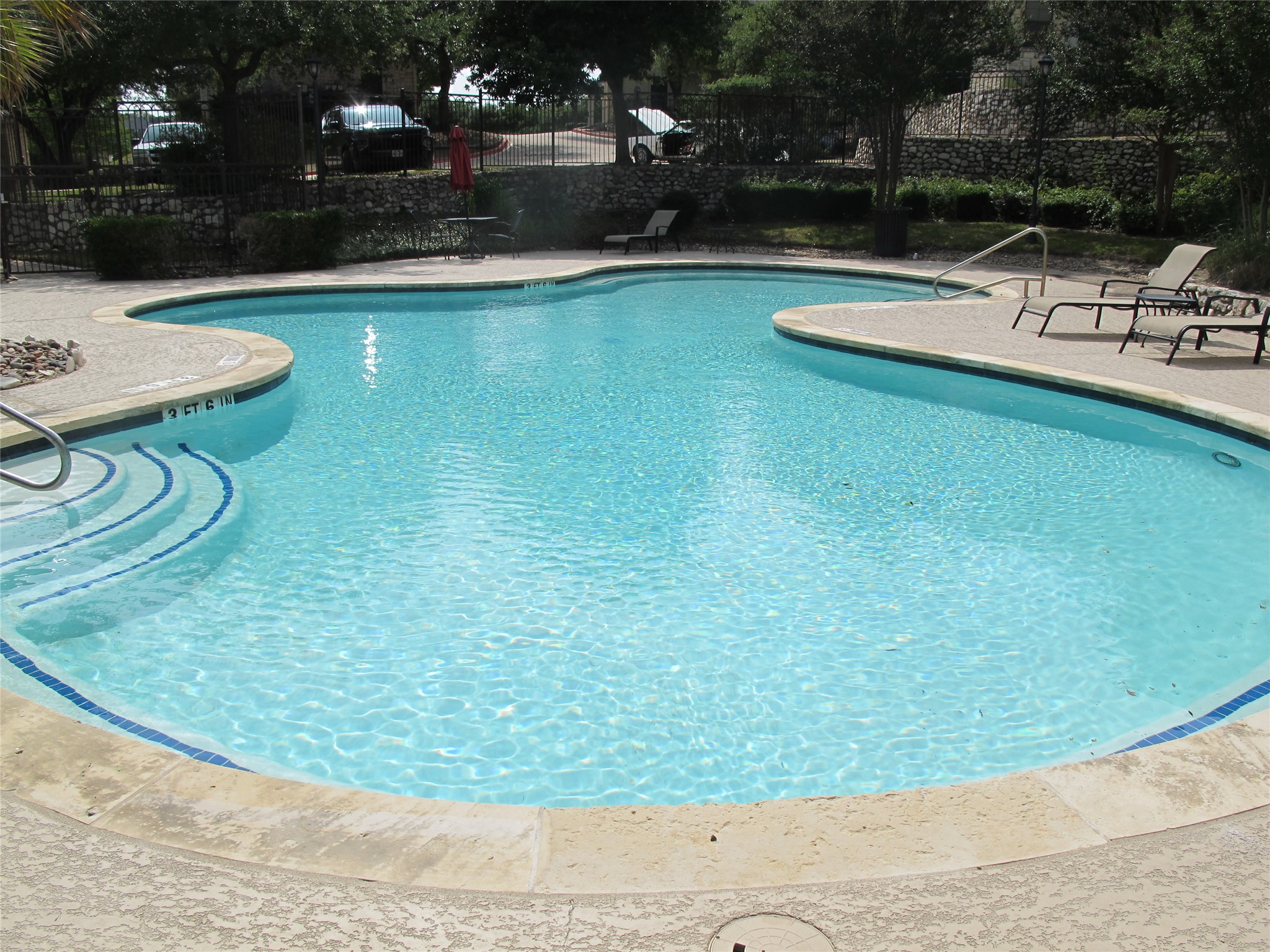 7701 Rialto Boulevard, Unit 1128 Austin, TX 78735 - Photo 35 of 35 a view of a swimming pool with a patio