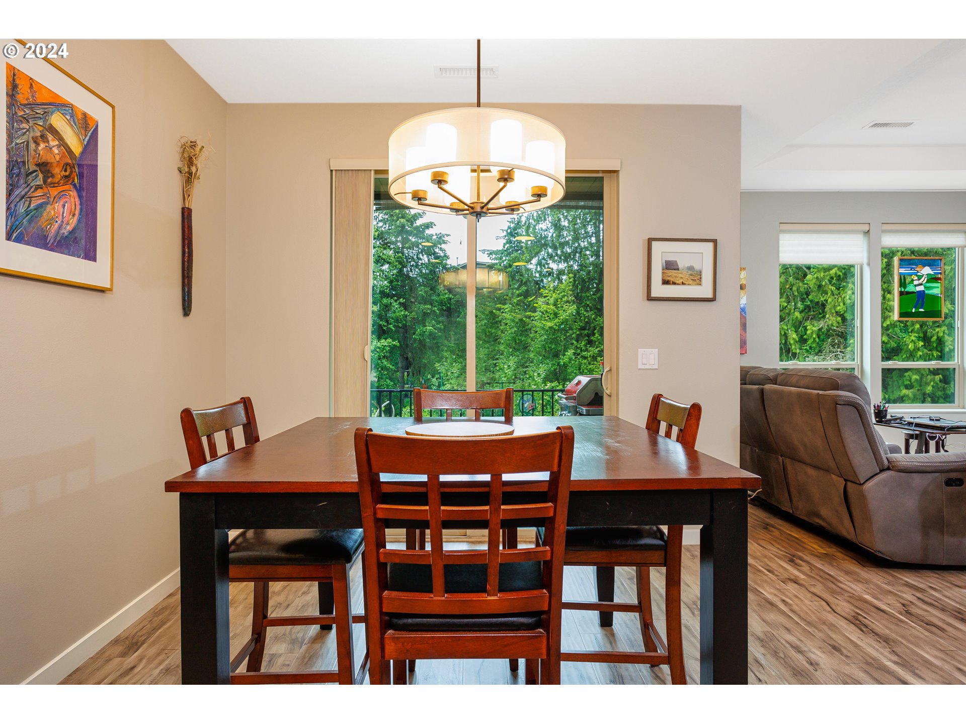 4313 North Ridgefield Woods Drive Ridgefield, WA 98642 - Photo 12 of 24 a view of a dining room with furniture window and outside view