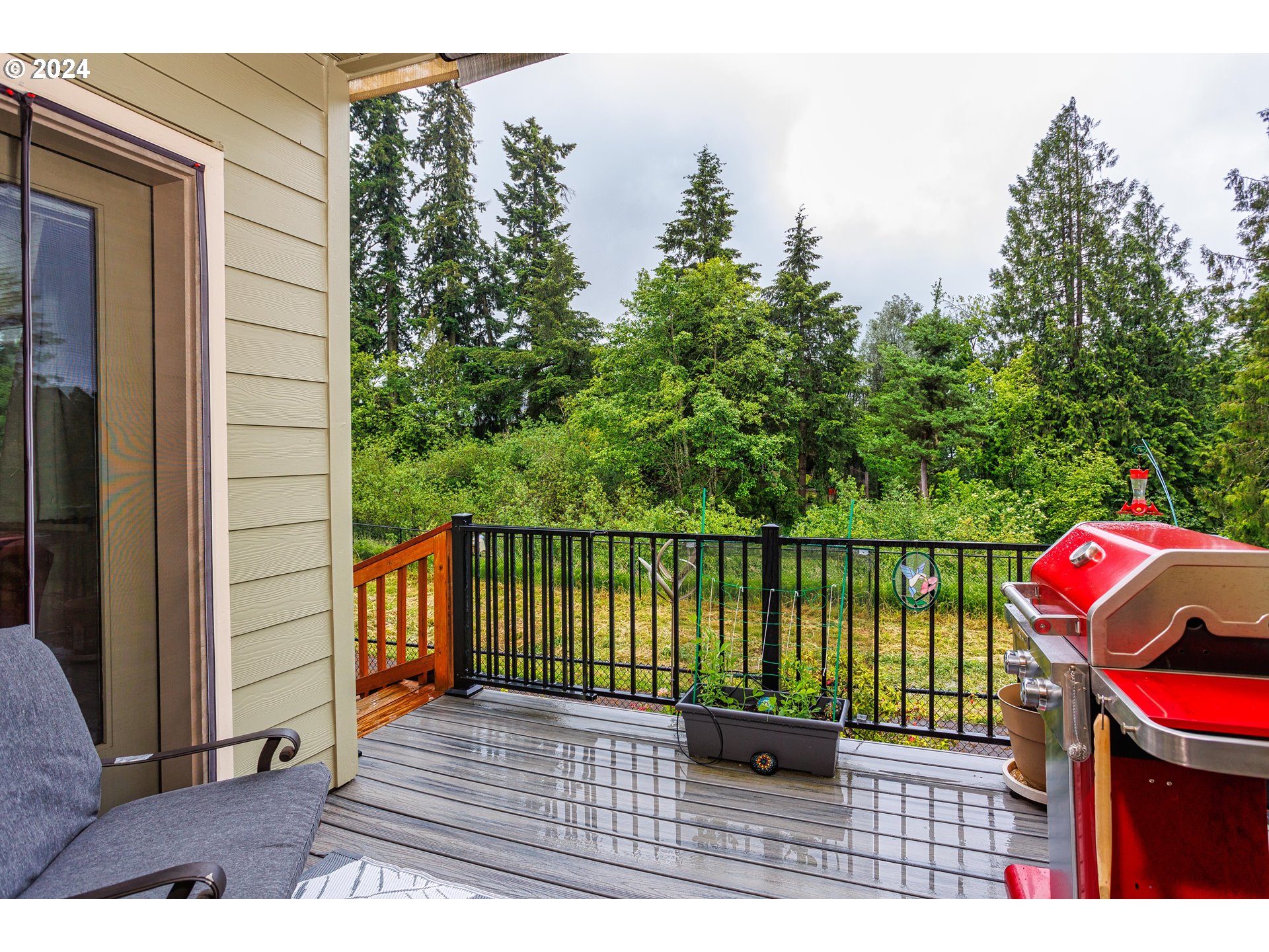 4313 North Ridgefield Woods Drive Ridgefield, WA 98642 - Photo 13 of 24 a balcony with an outdoor seating