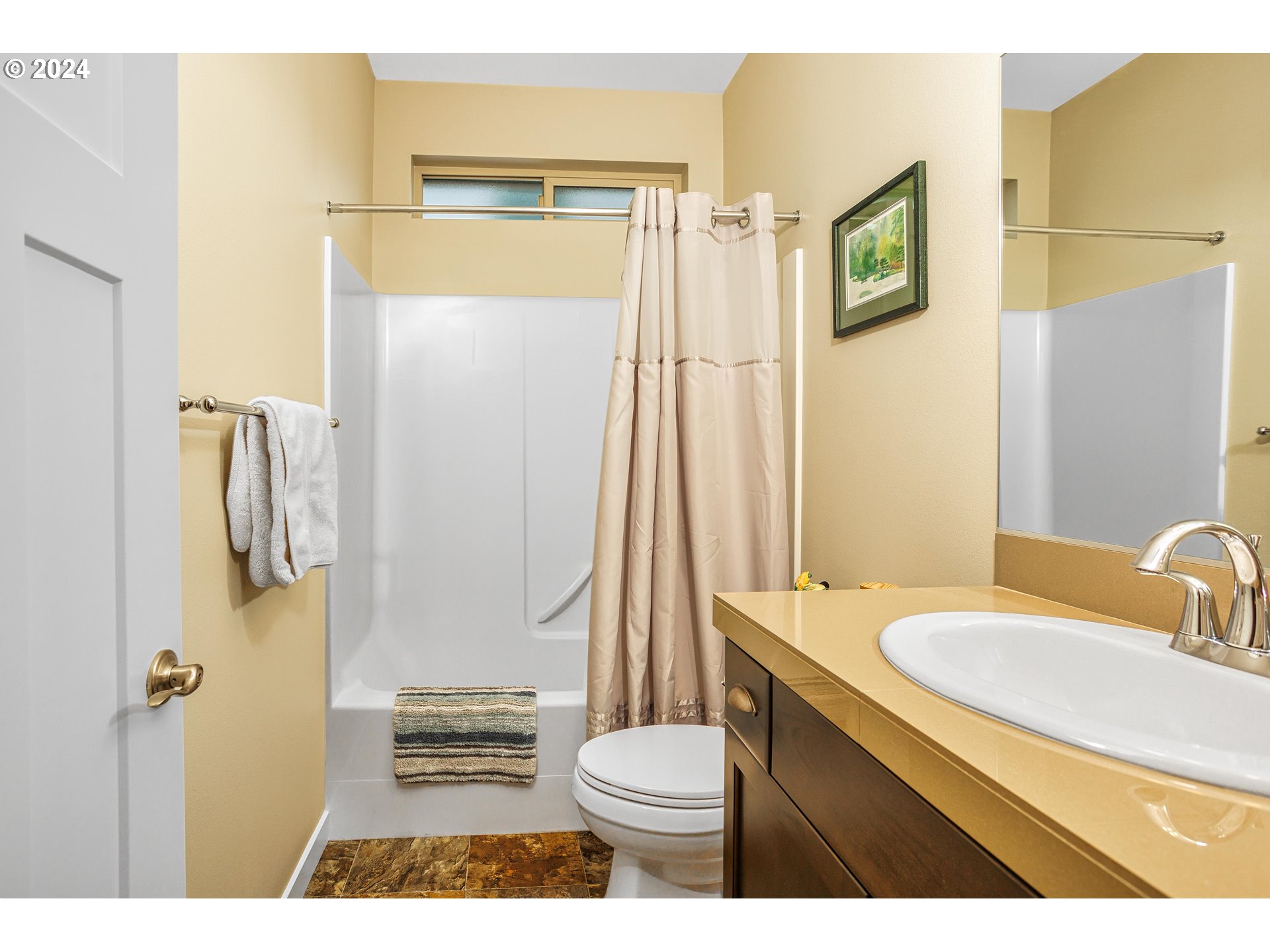 4313 North Ridgefield Woods Drive Ridgefield, WA 98642 - Photo 20 of 24 a bathroom with a sink toilet and shower