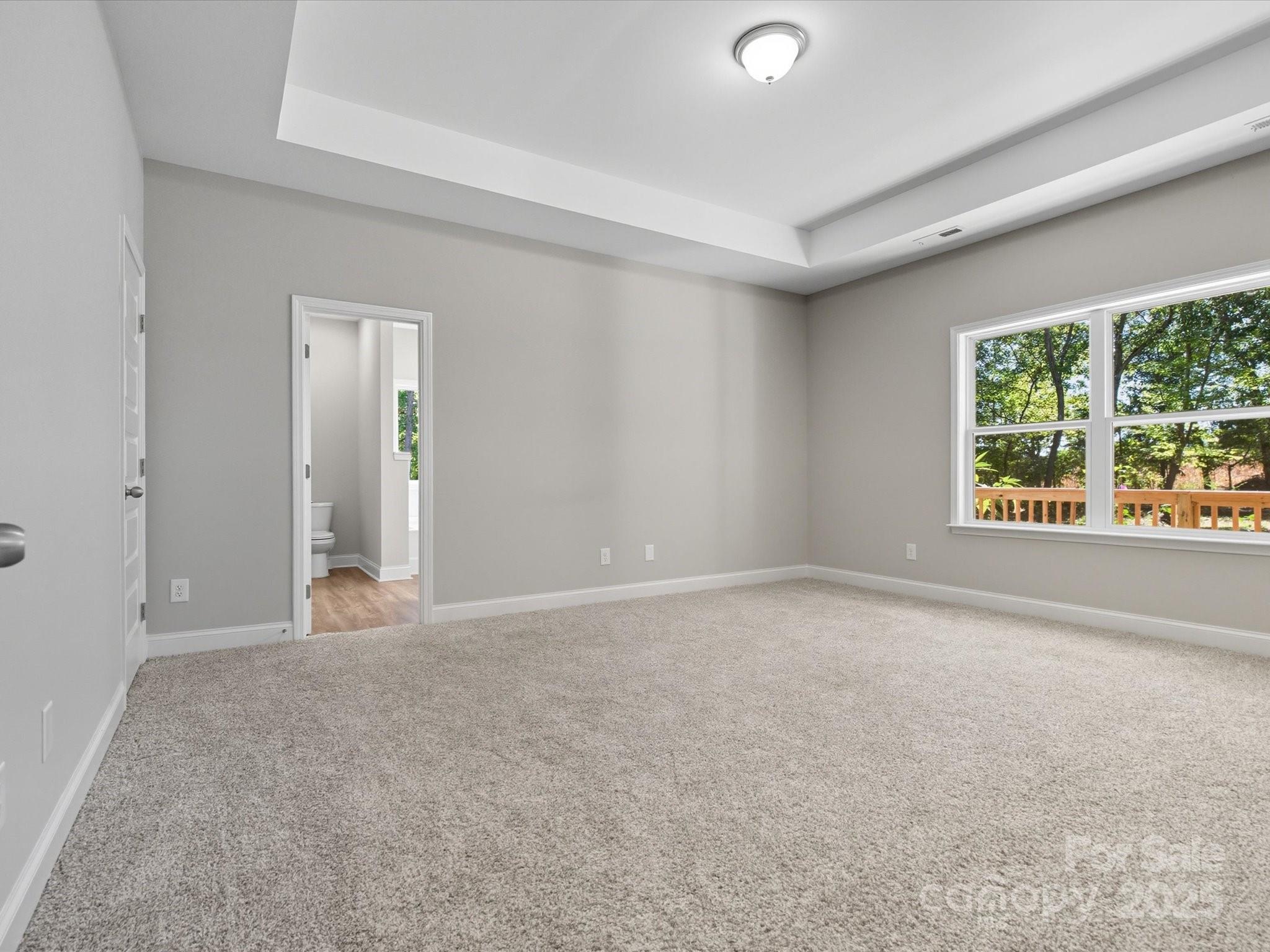 1830 Austin Chaney Road Wingate, NC 28174 - Photo 15 of 39 a view of an empty room with a window