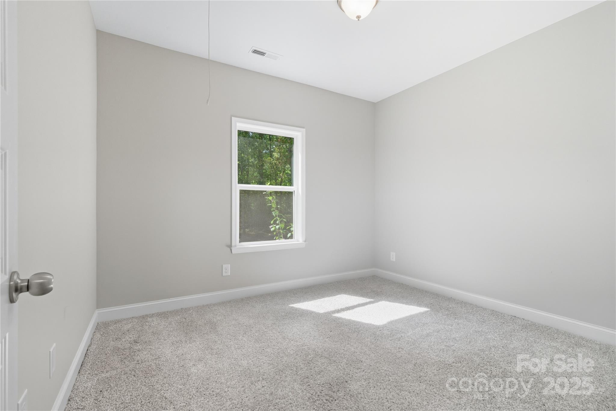 1830 Austin Chaney Road Wingate, NC 28174 - Photo 20 of 39 an empty room with a window