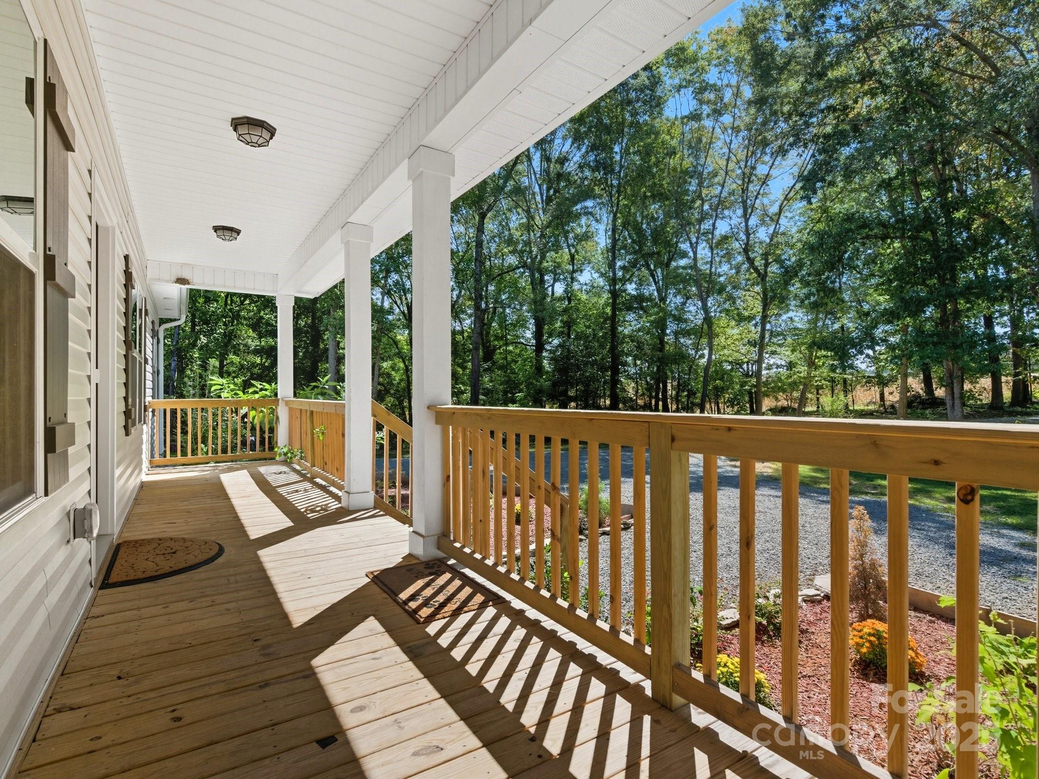 1830 Austin Chaney Road Wingate, NC 28174 - Photo 24 of 39 a view of a balcony with wooden floor