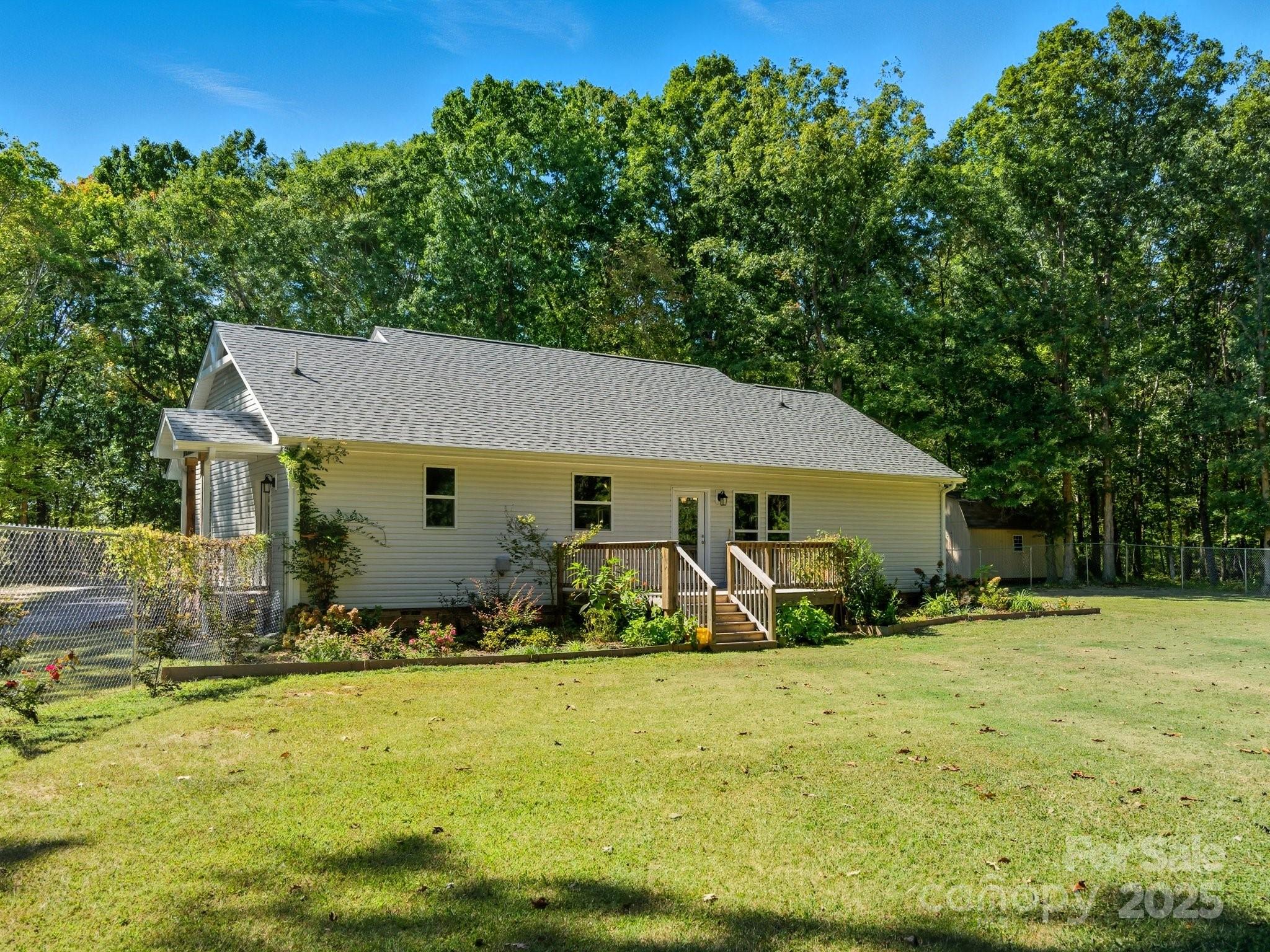 1830 Austin Chaney Road Wingate, NC 28174 - Photo 25 of 39 a view of a house with backyard