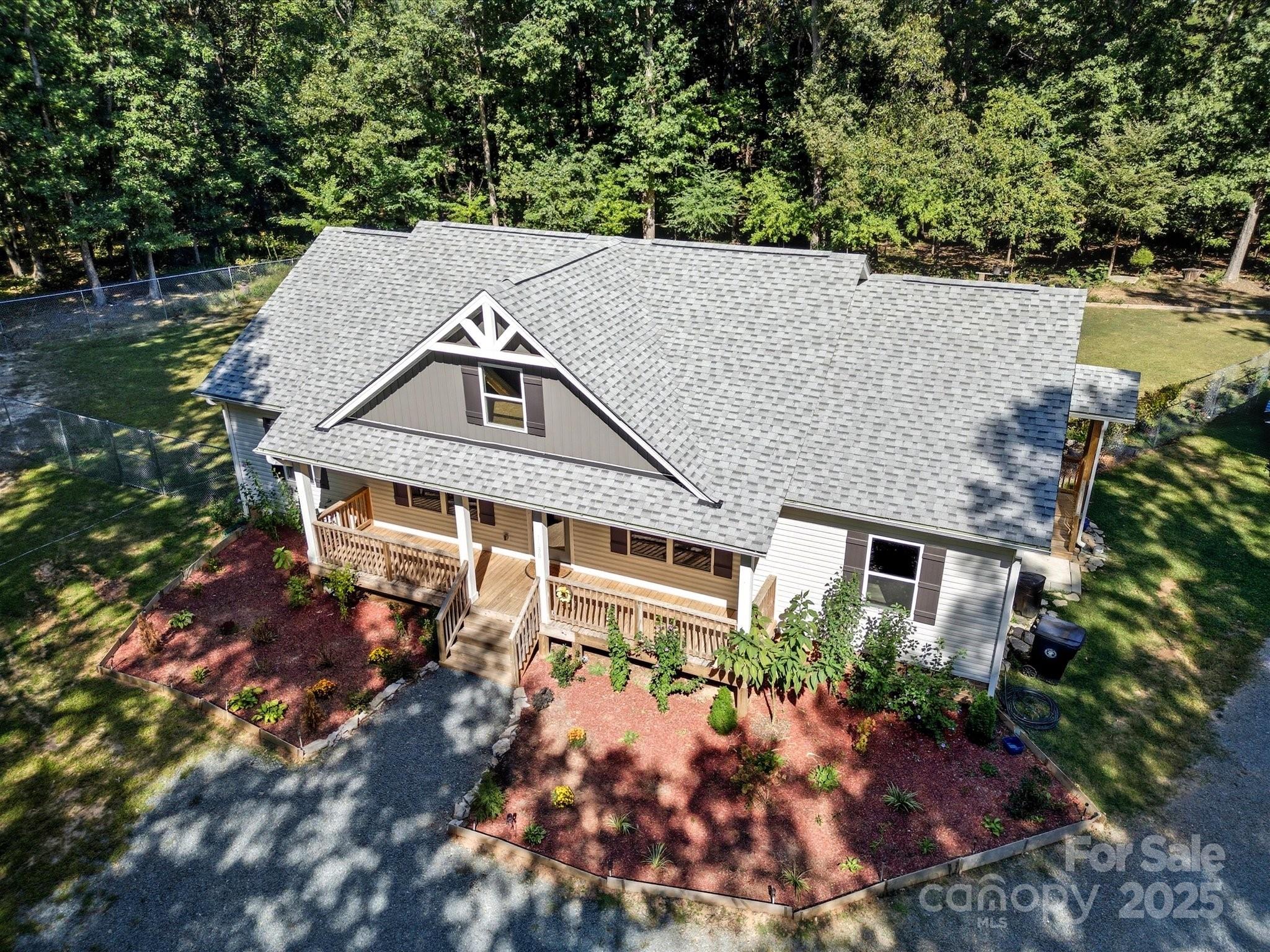 1830 Austin Chaney Road Wingate, NC 28174 - Photo 28 of 39 a aerial view of a house with a yard