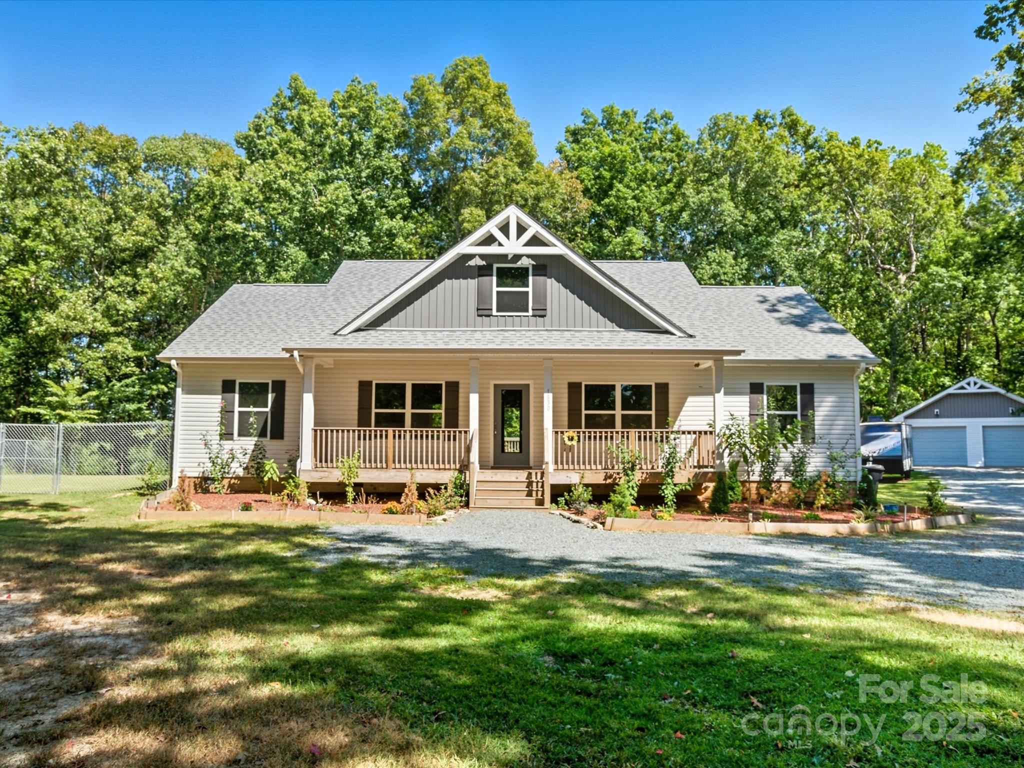 1830 Austin Chaney Road Wingate, NC 28174 - Photo 29 of 39 a front view of a house with a yard