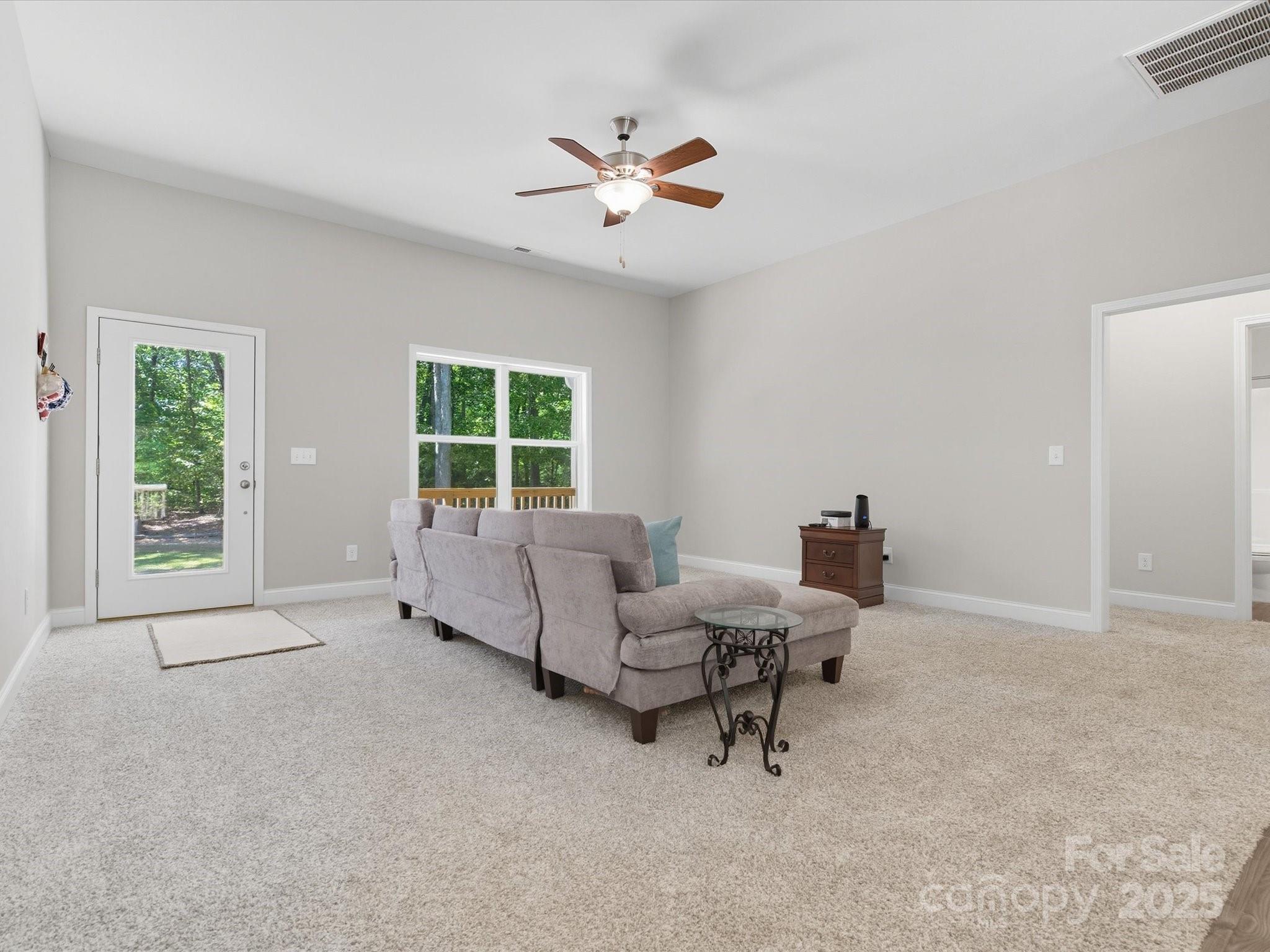 1830 Austin Chaney Road Wingate, NC 28174 - Photo 4 of 39 a living room with furniture and windows