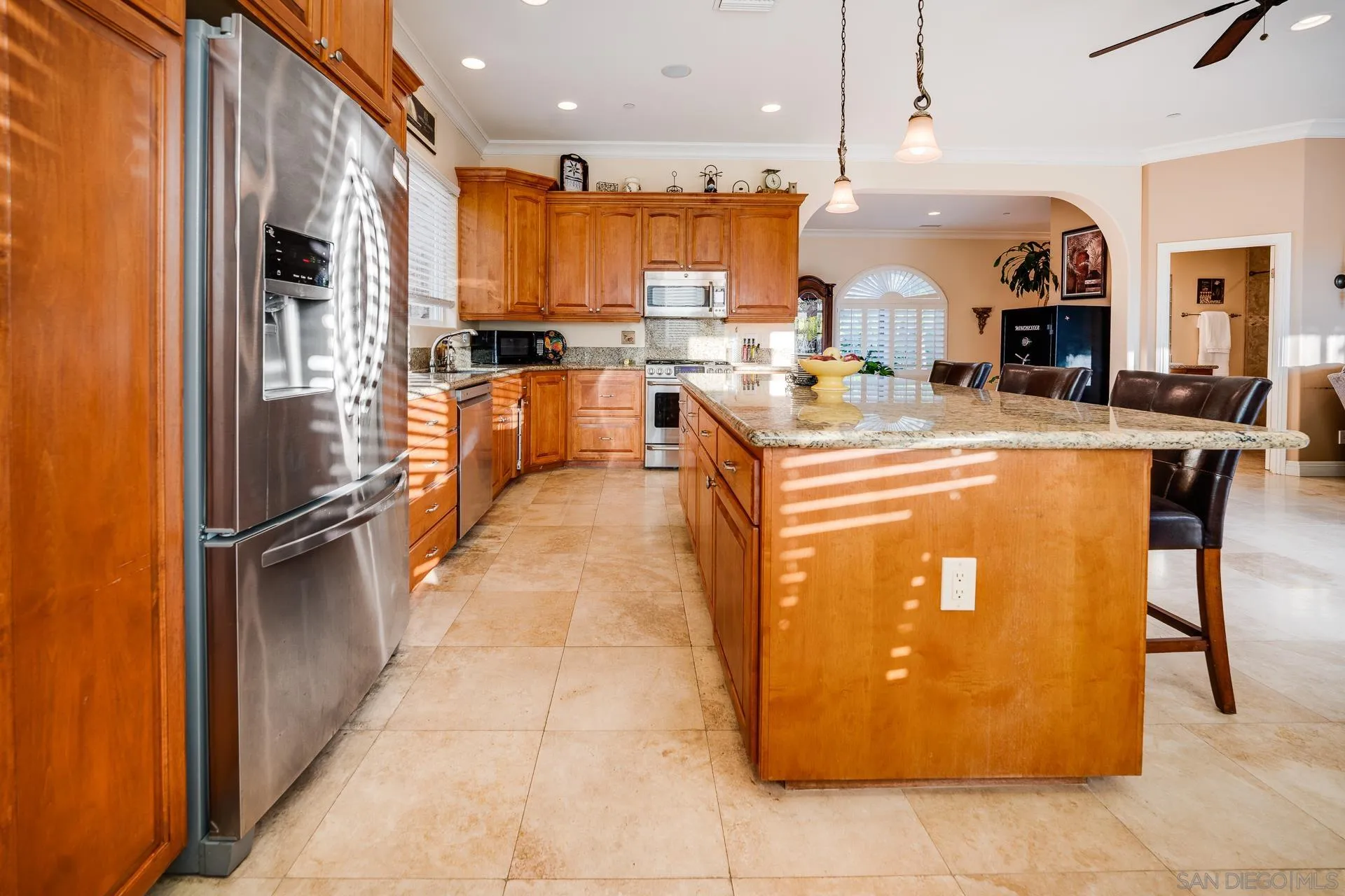 15380 Oak Canyon Road Poway, CA 92064 - Photo 12 of 52 a kitchen with stainless steel appliances granite countertop a refrigerator a oven and a sink