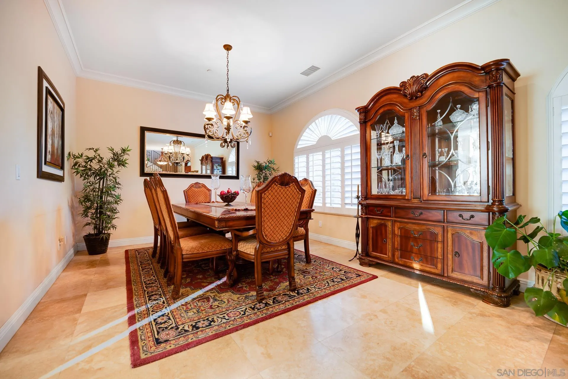 15380 Oak Canyon Road Poway, CA 92064 - Photo 14 of 52 a dining room with furniture a rug and a chandelier