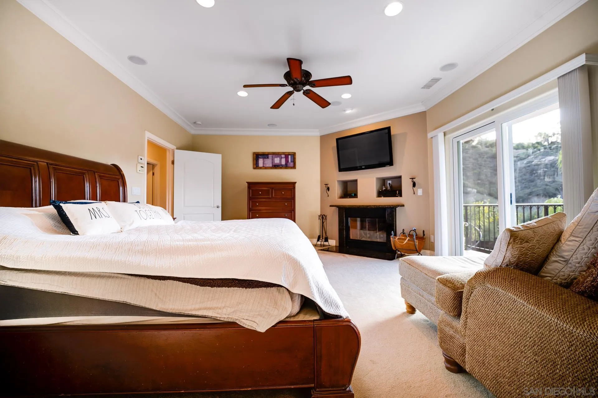 15380 Oak Canyon Road Poway, CA 92064 - Photo 19 of 52 a bedroom with a bed and furniture