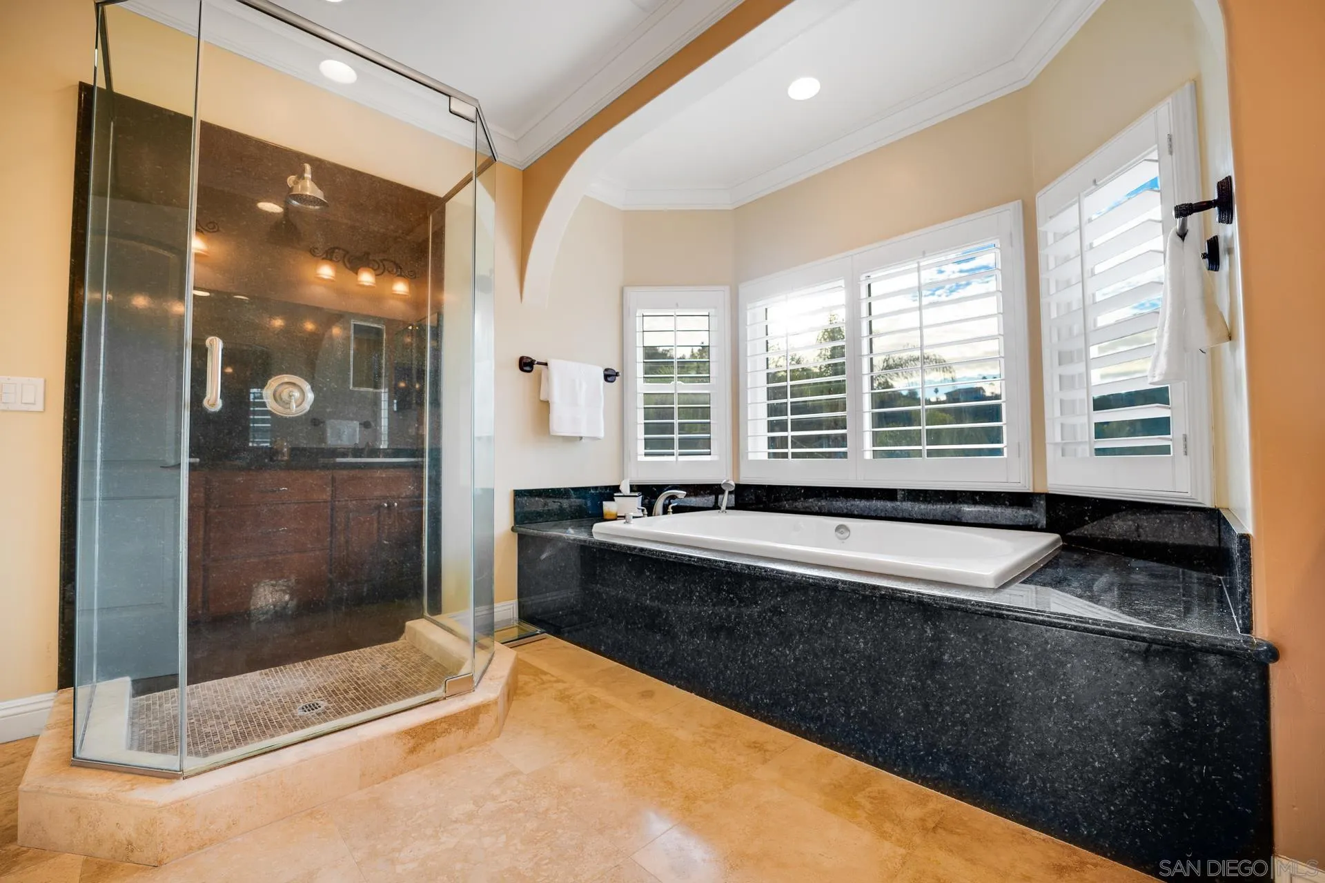 15380 Oak Canyon Road Poway, CA 92064 - Photo 20 of 52 a large bathroom with a tub and shower