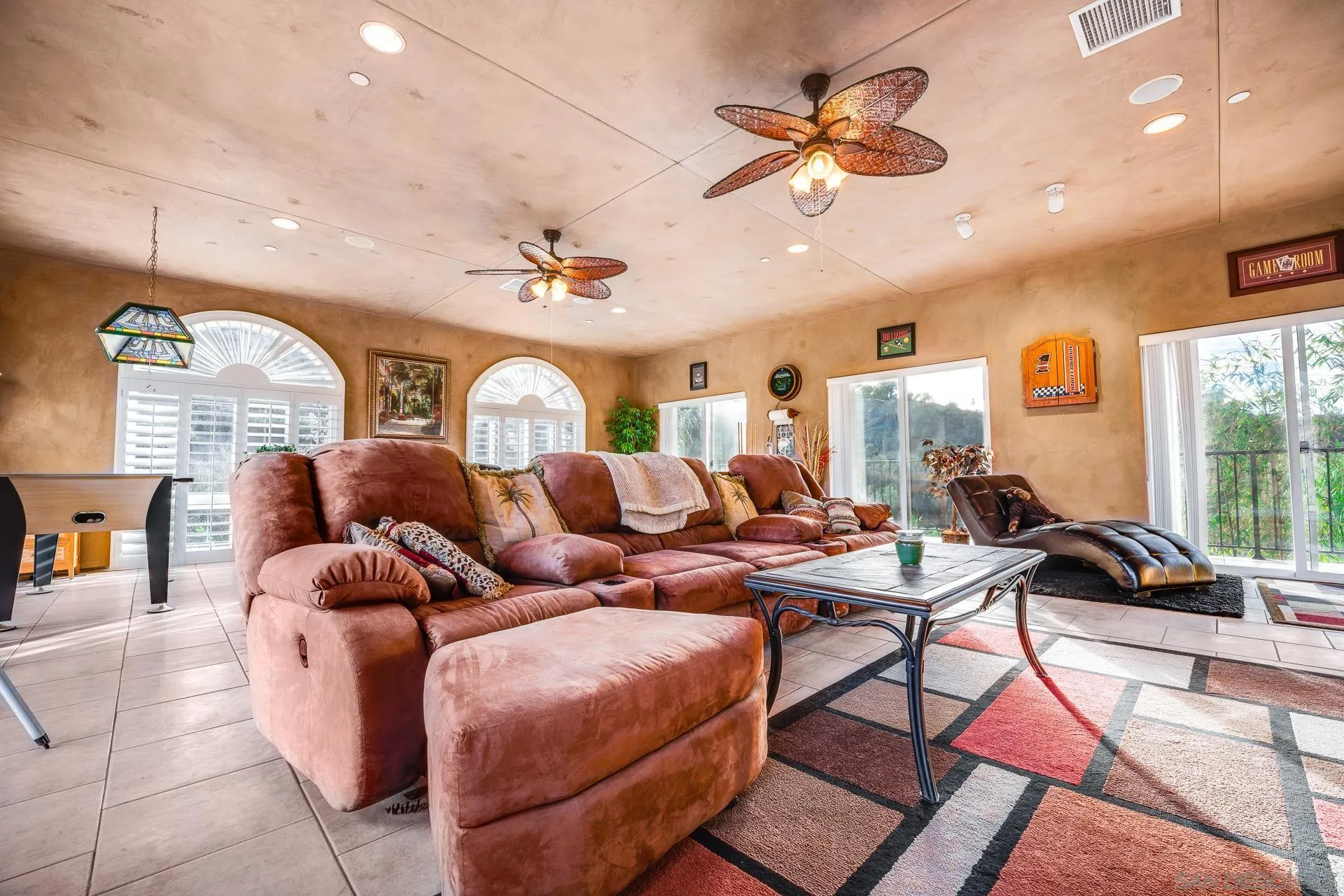 15380 Oak Canyon Road Poway, CA 92064 - Photo 26 of 52 a living room with furniture a rug and a chandelier