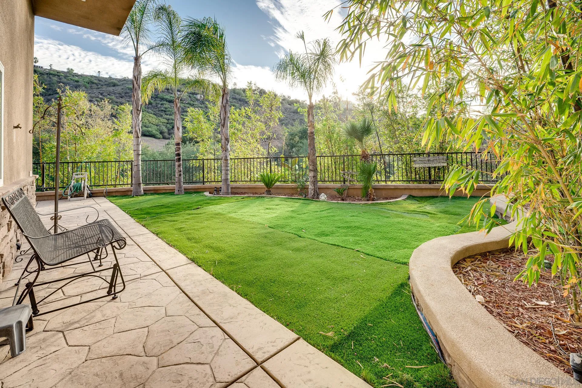 15380 Oak Canyon Road Poway, CA 92064 - Photo 32 of 52 a view of a garden with a slide