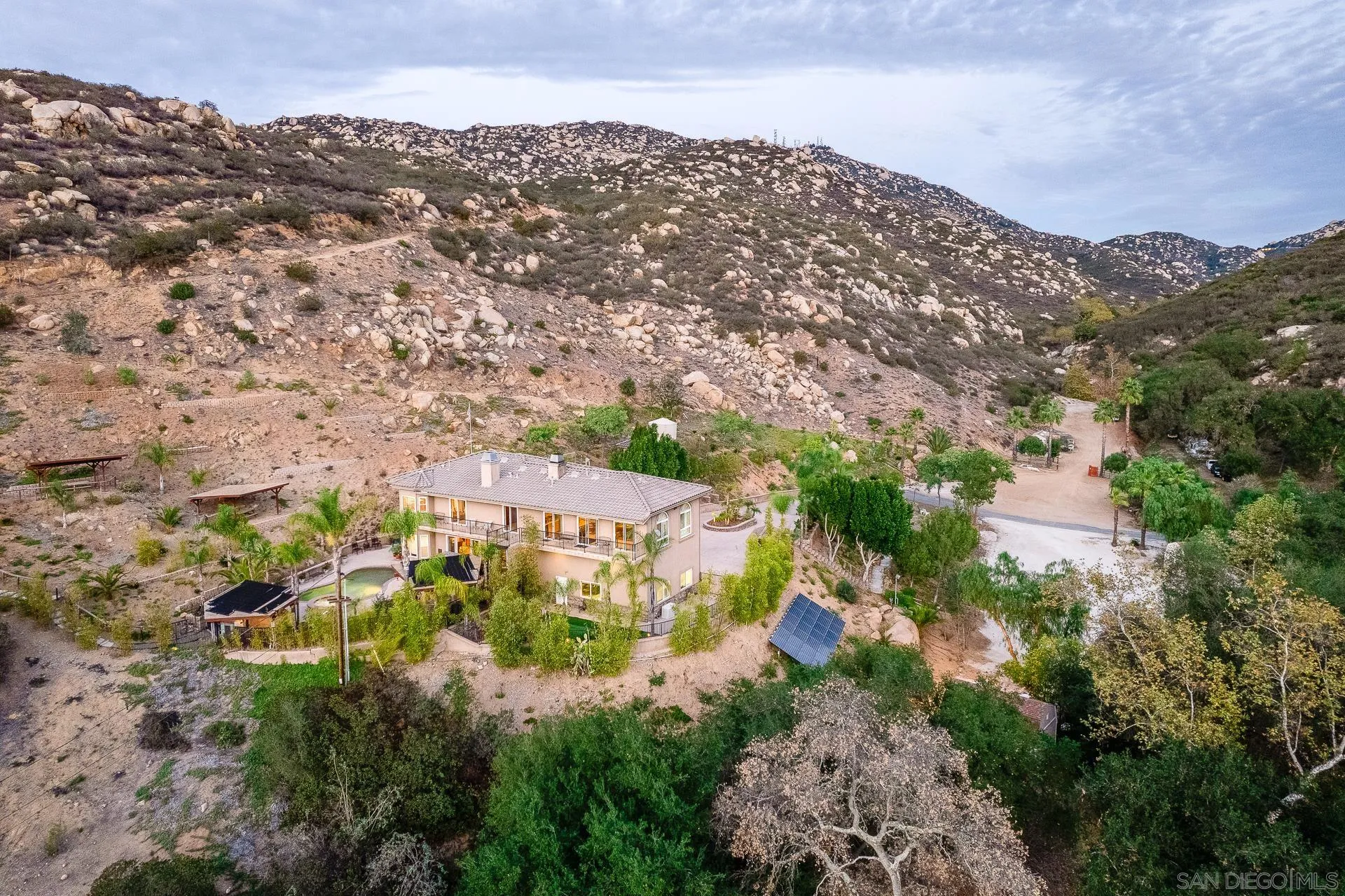 15380 Oak Canyon Road Poway, CA 92064 - Photo 39 of 52 an aerial view of residential houses with outdoor space and trees