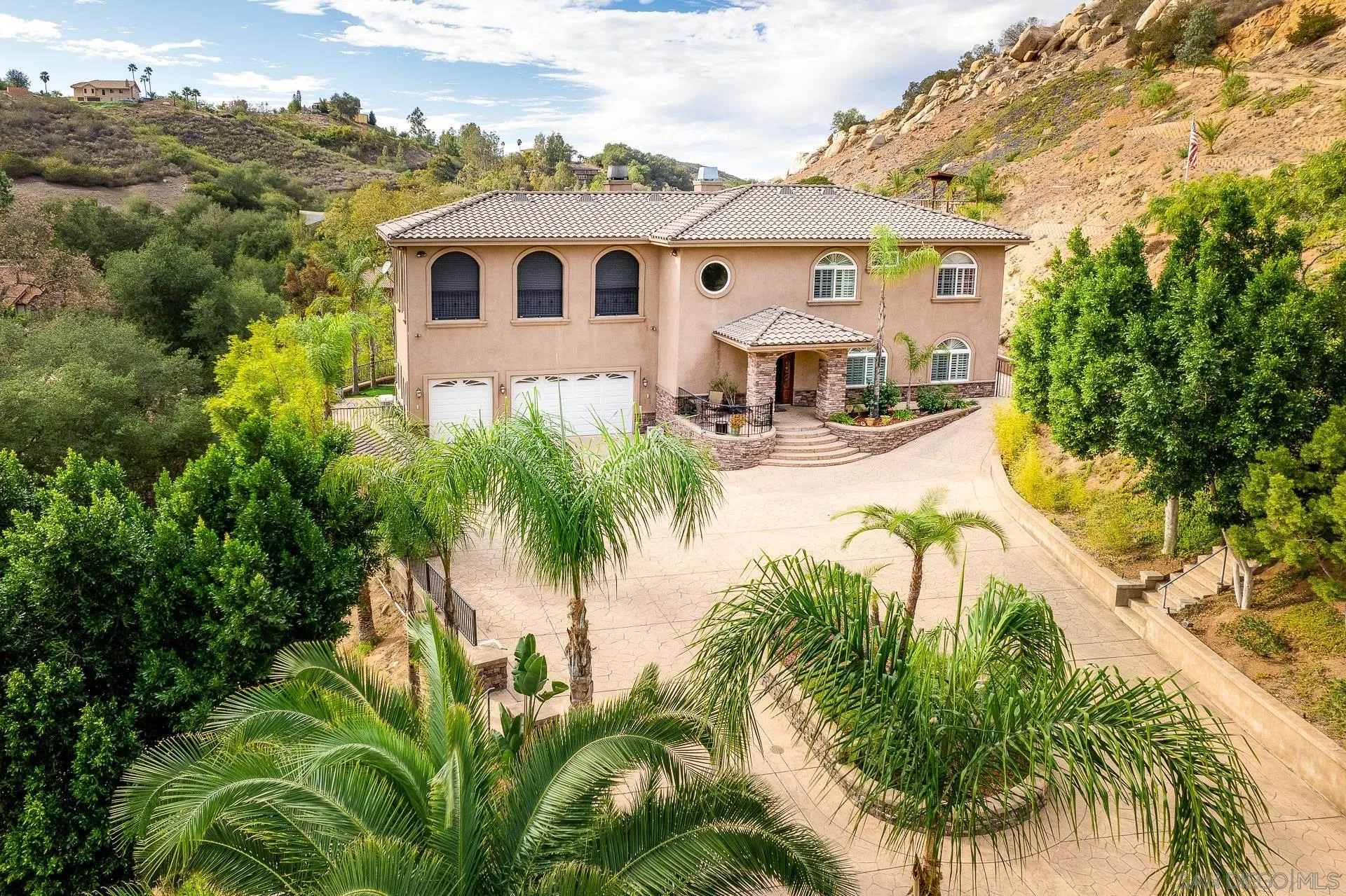 15380 Oak Canyon Road Poway, CA 92064 - Photo 41 of 52 a view of a house with a swimming pool
