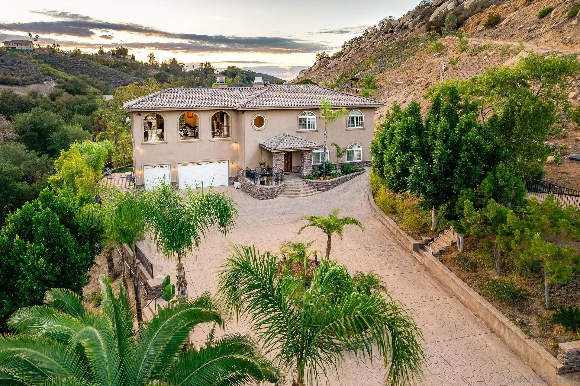 15380 Oak Canyon Road Poway, CA 92064 - Photo 43 of 52 an aerial view of a house with garden space and swimming pool