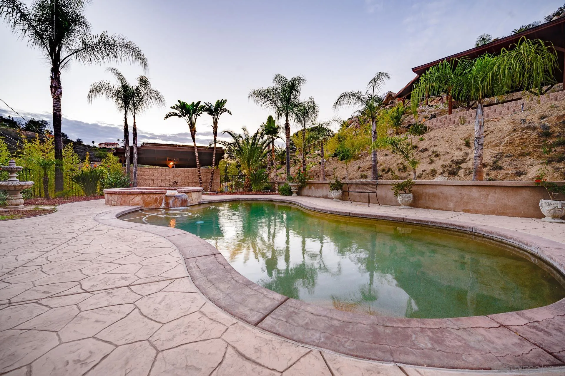 15380 Oak Canyon Road Poway, CA 92064 - Photo 45 of 52 a view of a swimming pool with a patio